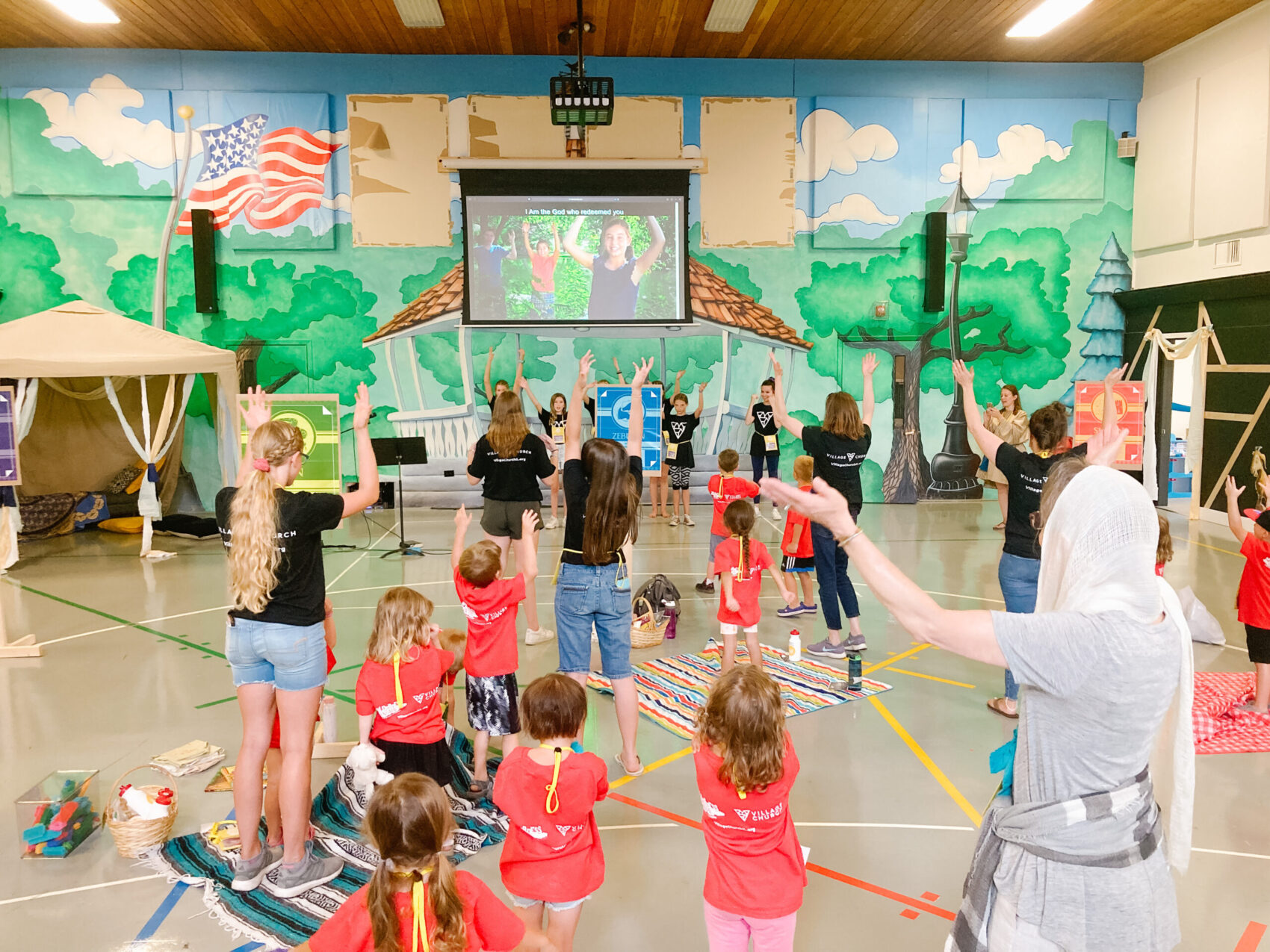 vacation bible school preschoolers and leaders singing together