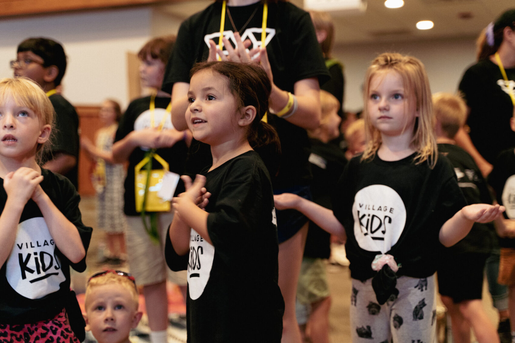 Vacation Bible School at village church of bartlett kids singing